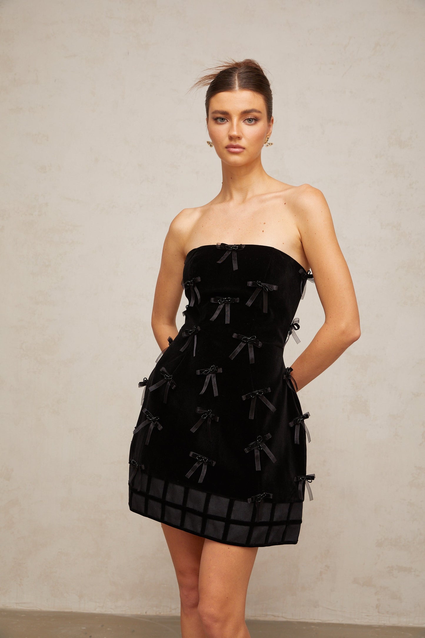 Geneviève black bow-detail mini dress