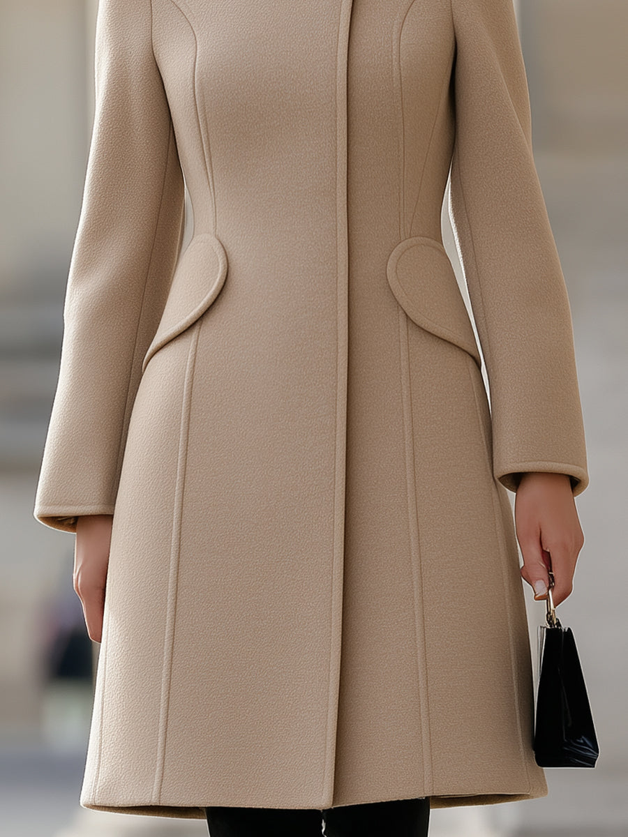 Elegant Beige Fitted Wool Coat, Combining Classic Style With Feminine Flair