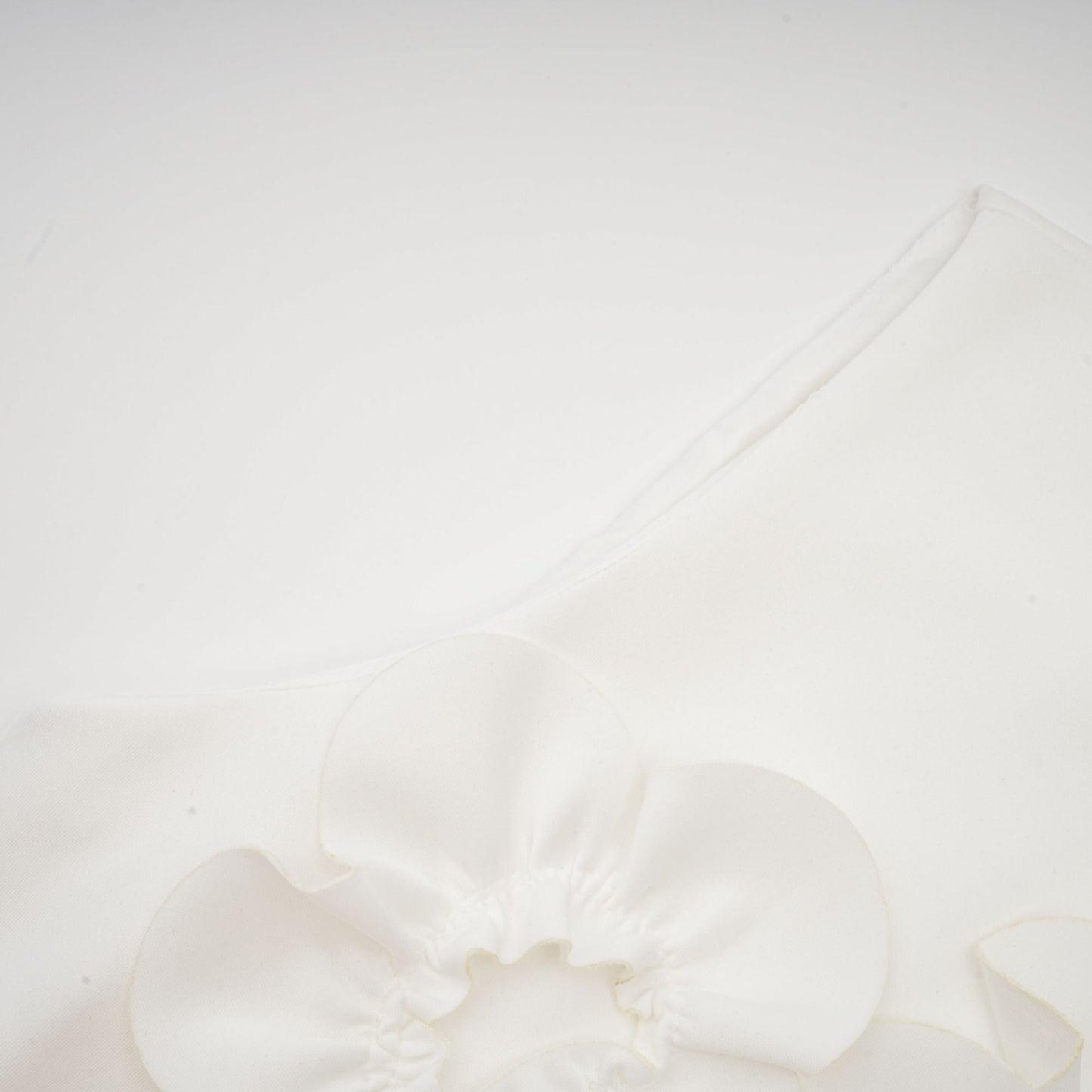 Magali White Sleeveless Maxi Dress with Faux Flower & Bow-Tie Embellishment