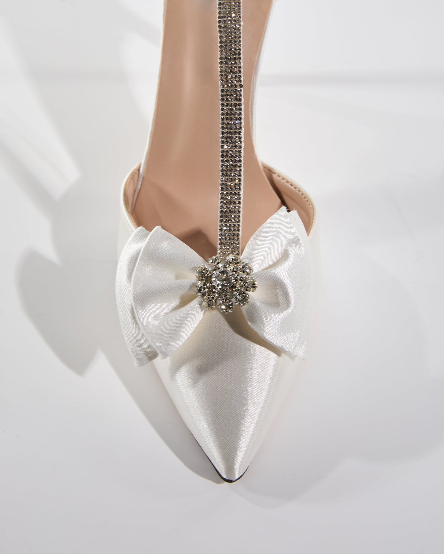 Zaina Bow Rhinestone T Strap Pumps In White