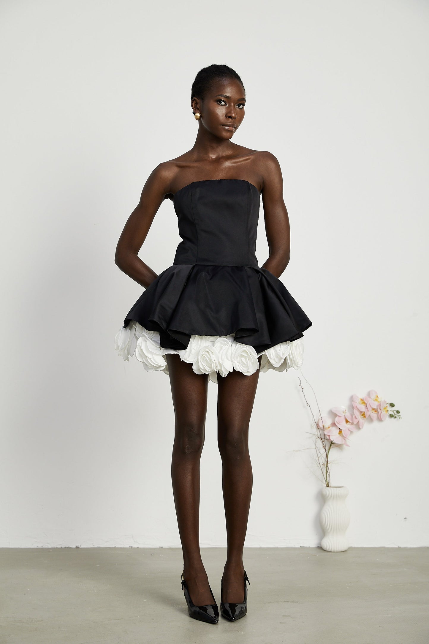 Lucie black petal-layered strapless corset mini dress