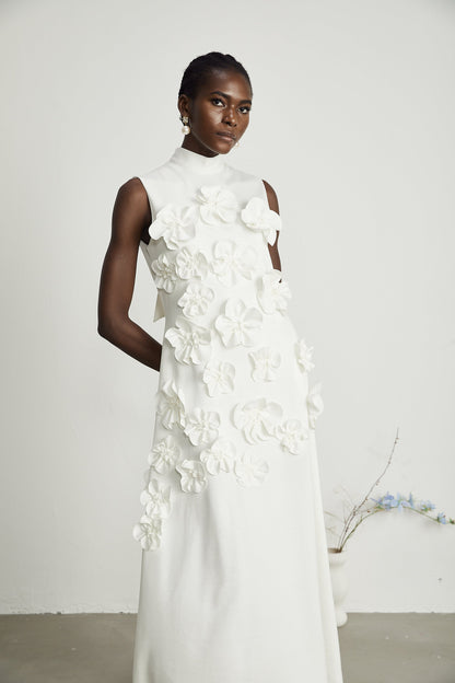 Magali White Sleeveless Maxi Dress with Faux Flower & Bow-Tie Embellishment