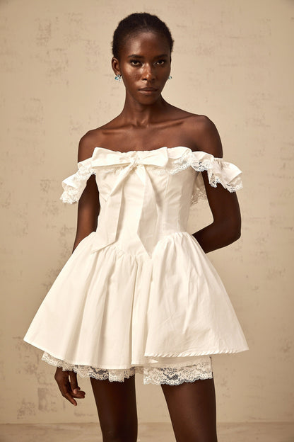 Arsène white oversize-bow ruffled mini dress