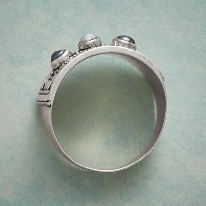 Geometric Ring with Carved Pearl and Three Stones