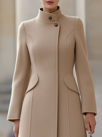 Elegant Beige Fitted Wool Coat, Combining Classic Style With Feminine Flair
