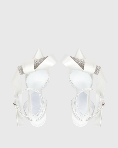Crocifissa Spiral Rhinestone Bow Pumps In White
