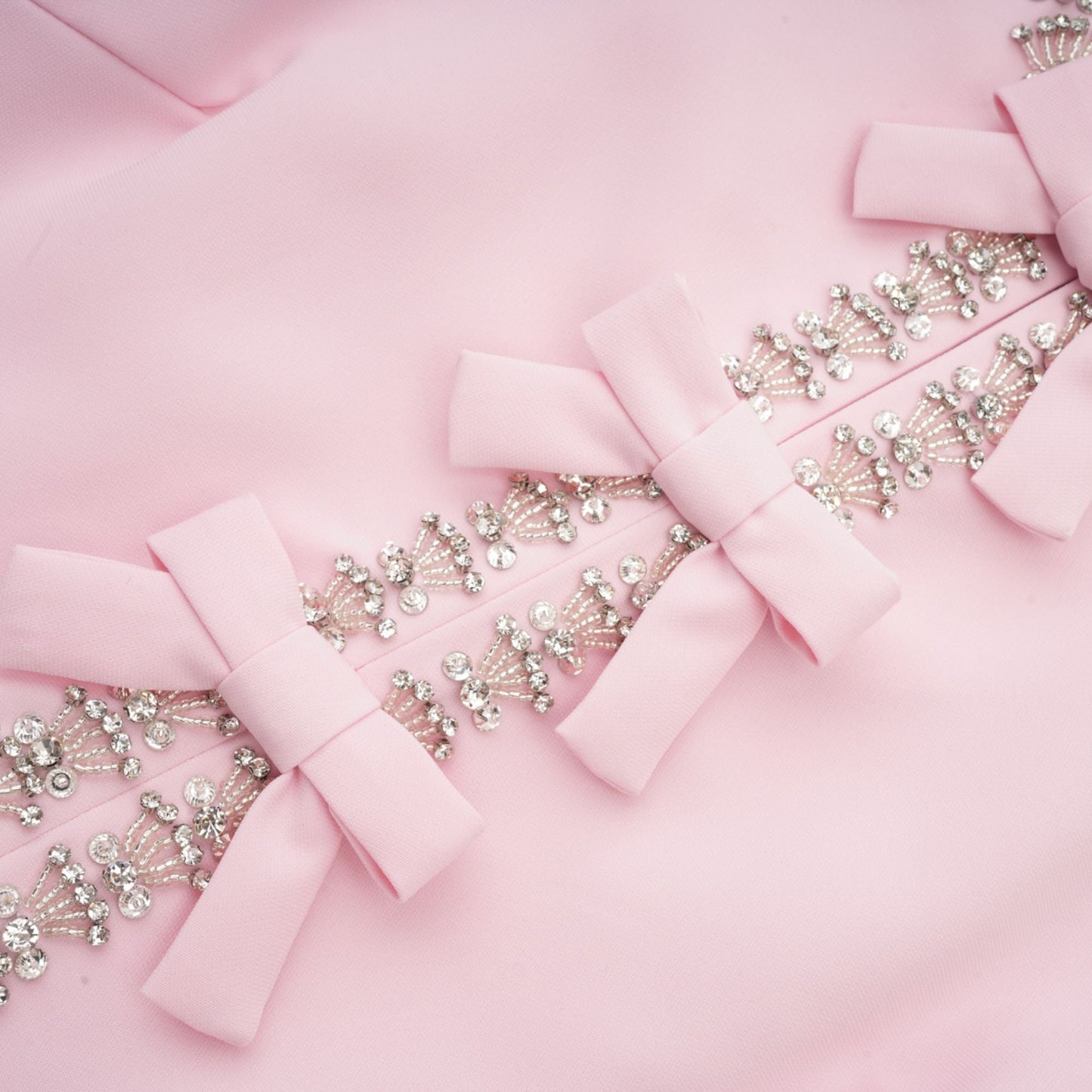 Cassi crystal-accented pink bow midi dress
