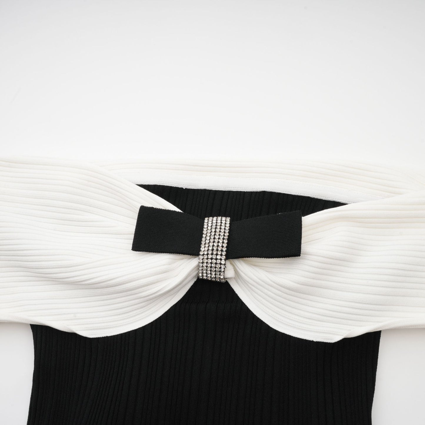 Angèle black off-shoulder knitted mini dress