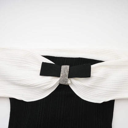 Angèle black off-shoulder knitted mini dress