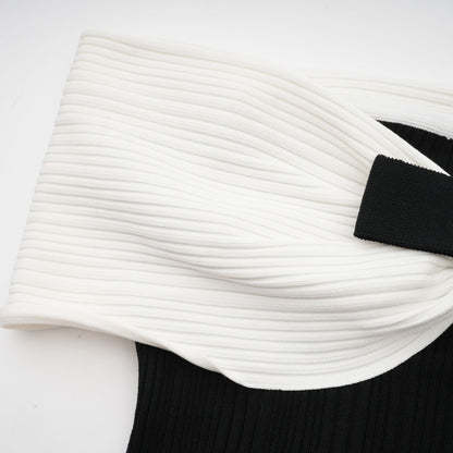 Angèle black off-shoulder knitted mini dress