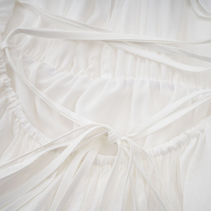 Quincie white shirred flounced mini dress
