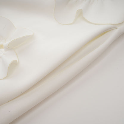 Magali White Sleeveless Maxi Dress with Faux Flower & Bow-Tie Embellishment