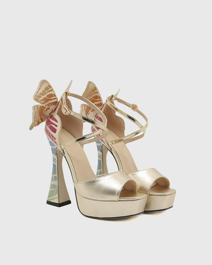 Rossa Wing Cross Strap Platform Flared Heels In Gold