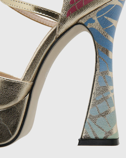 Rossa Wing Cross Strap Platform Flared Heels In Gold