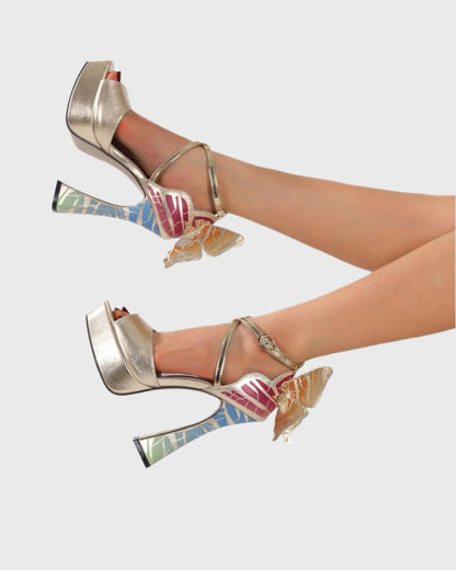 Rossa Wing Cross Strap Platform Flared Heels In Gold